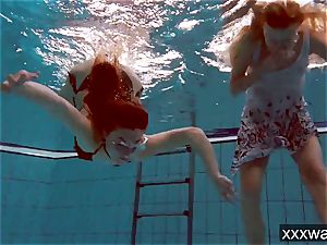red-hot Russian damsels swimming in the pool